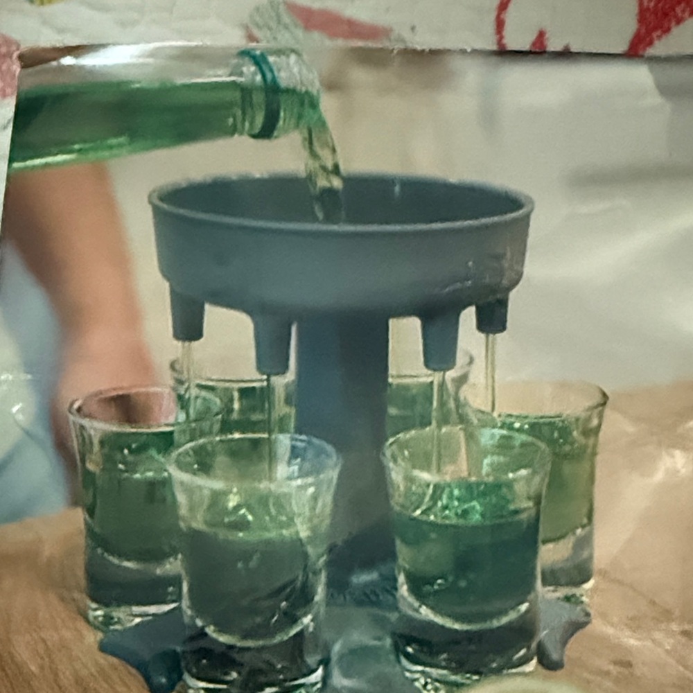 Gray Drink Dispenser with Green Glasses